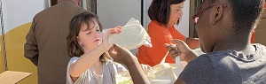 Students filling food bags